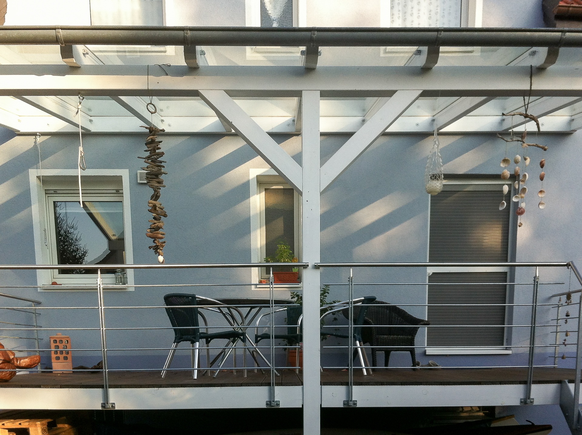 Balkon mit Glasdach